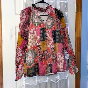 Multi color button up blouse. Light, long sleeved.